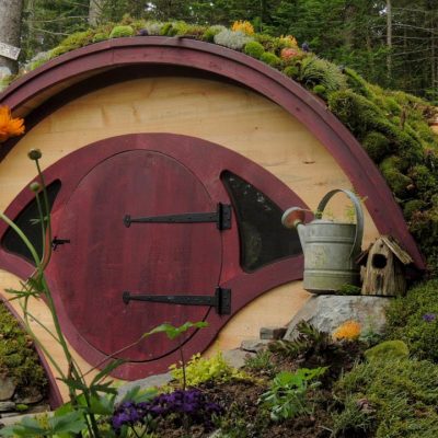 Finished hobbit hole with a moss roof